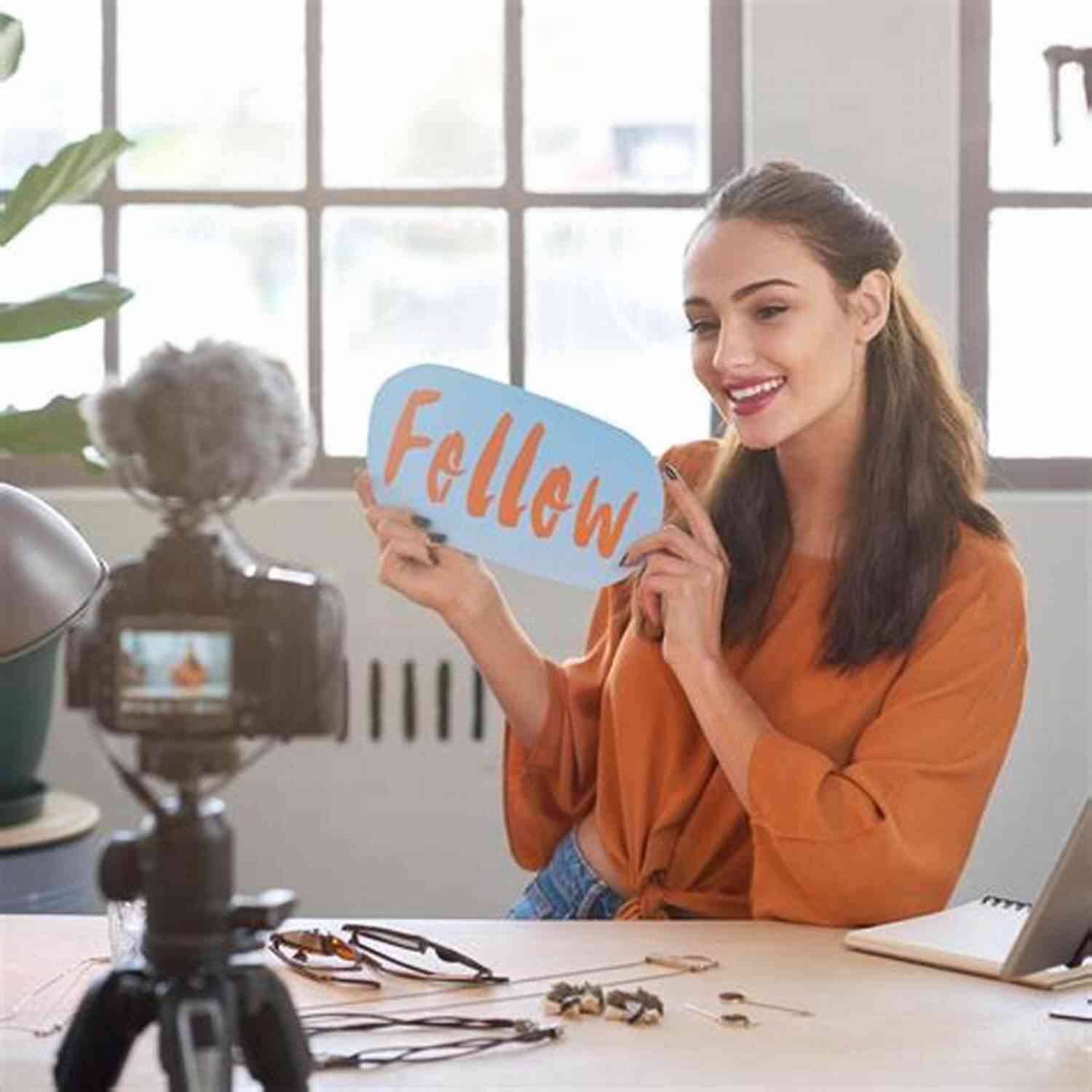 Influencer Marketing A Girl Holding A Camera And Smiling Set On You (The Influencer 1)