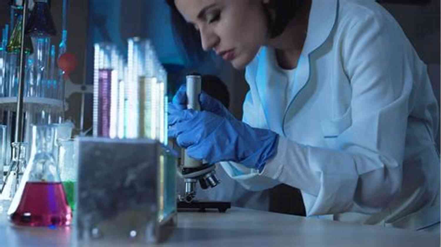 Scientist Looking At Test Tubes In A Lab How To Not Die Alone: The Surprising Science That Will Help You Find Love